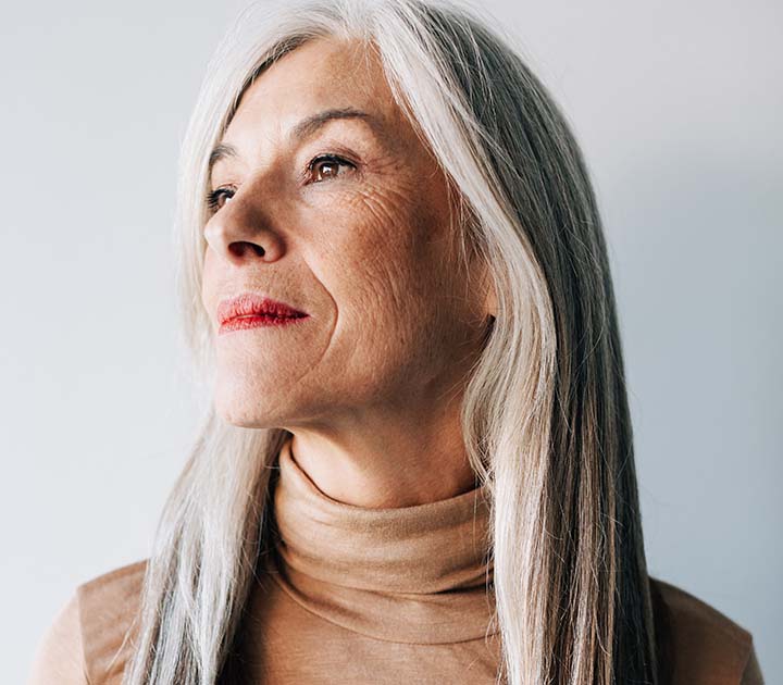 Woman with long grey hair